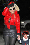 Mariah Carey and Nick Cannon keep a tight hold of the twins as they take a snowy stroll