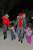 Mariah Carey and Nick Cannon keep a tight hold of the twins as they take a snowy stroll