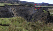 A field has disappeared into a giant sink hole at Foolow in The Derbyshire Peak District.  Locals claim the huge hole, measuring more than 160 ft across and 130 ft deep, which began collapsing yesterday and is still growing, was caused when part