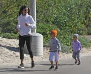 Exclusive... Matthew McConaughey Goes For A Jog In Malibu With His Family 