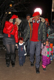 Mariah Carey and Nick Cannon keep a tight hold of the twins as they take a snowy stroll