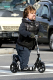 Peter Dinklage scoots around NYC