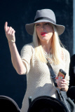 *EXCLUSIVE* Tori Spelling flashes family portrait on phone amdist divorce rumors