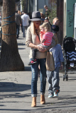 *EXCLUSIVE* Tori Spelling flashes family portrait on phone amdist divorce rumors