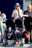 *EXCLUSIVE* Tori Spelling flashes family portrait on phone amdist divorce rumors