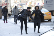 Slipping pedestrians on NYC icy sidewalk