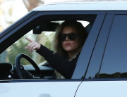 EXCL Khloe Kardashian points at a deer 