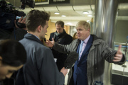 London Mayor Boris Johnson speaks to the media at London Bridge station during a strike