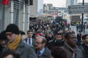 Commuters struggle to get to work during a strike by members of the RMT & TSSA trade unions in London