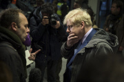 London Mayor Boris Johnson speaks to the media at London Bridge station during a strike