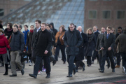 Commuters struggle to get to work during a strike by members of the RMT & TSSA trade unions in London