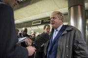London Mayor Boris Johnson speaks to the media at London Bridge station during a strike