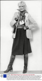 Lean Cream Flannel Jacket By Stirling Cooper. Red And Brown Check Shirt From Miss Selfridge Skirt By Mary Quant At Harvey Nichols. Tomato Fringed Scarf Gilt Razor On A Chain And Gilt Whistle On A Cord. Purse Belt And Brazilian Boots All At Miss Selfr