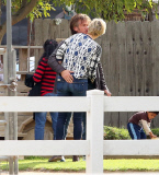 EXCLUSIVE - Sean Penn can't resist getting a a mouthful of Charlize at the petting zoo  Pt 2