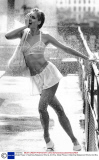 Model Poses In Matching Waterproof Shorts And Bra.