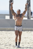 Kelly Brook swoons over David McIntosh¿s muscles