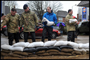 Prince William and Harry put snadbags out in the floods