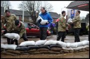 Prince William and Harry put snadbags out in the floods
