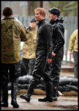 Prince William and Harry put snadbags out in the floods