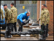 Prince William and Harry put snadbags out in the floods