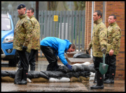 Prince William and Harry put snadbags out in the floods