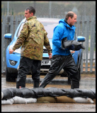 Prince William and Harry put snadbags out in the floods