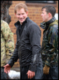 Prince William and Harry put snadbags out in the floods