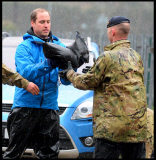 Prince William and Harry put snadbags out in the floods