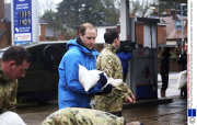 Prince Harry and Prince William help out with the flood relief efforts in Datchet, Berkshire, Britain - 14 Feb 2014