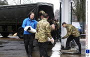 Prince Harry and Prince William help out with the flood relief efforts in Datchet, Berkshire, Britain - 14 Feb 2014