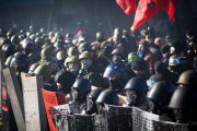 Anti-government protesters clash with the police in Kiev
