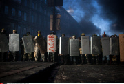Anti-government protesters clash with the police in Kiev