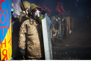 Anti-government protesters clash with the police in Kiev