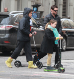 Hugh Jackman and Family Riding Scooters to Church