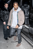 Kim Kardashian heads back the apartment with her fiance Kanye West