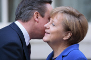 DAVID CAMERON GREETING ANGELA MERKEL ARRIVING TO DOWNING STREET IN LONDON
