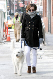 Olivia Wilde gets bundled up to walk Paco