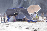 Minnie Driver and Henry have a day at the beach with friends