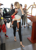 Charlize Theron & Son Jackson Departing On A Flight At LAX 