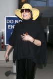 Liza Minnelli arrives in Los Angeles with a smile
