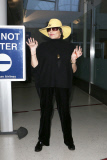 Liza Minnelli arrives in Los Angeles with a smile
