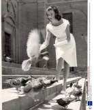 White Silk Jersey Dress By Emilio Pucci And Worn By Model Romana Simonini In The Market Square In Florence 1960.