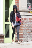 Charlize Theron covers up as she leaves her yoga class
