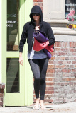 Charlize Theron covers up as she leaves her yoga class