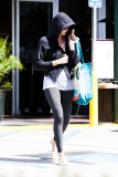 Charlize Theron covers up as she leaves her yoga class