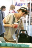 Naomi Watts totes around a cart full of Goodies from the Farmer's Market