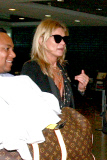 Kate Moss brings a lot of Baggage to Sao Paulo