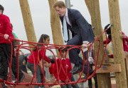  Prince Harry playing with local school children from Gainsborough Primary school in Newham at the new Queen Elizabeth Olympic Park, with the Mayor of London, Boris Johnson. The park will open to the public on Saturday 5th April. 14