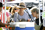 Julie Bowen gets a taste of some Shaved Ice at the Farmers Market