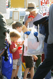 Julie Bowen gets a taste of some Shaved Ice at the Farmers Market